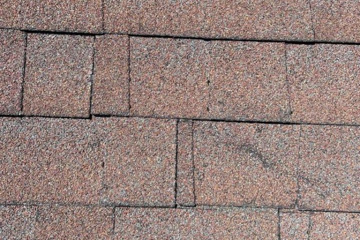 cracked roof shingles in edgewater home